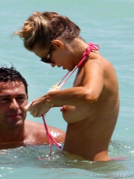 Joanna Krupa nude topless swimming caught flash paparazzi