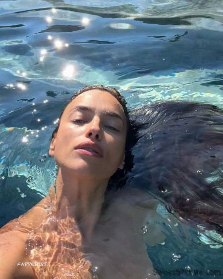Irina Shayk Swimming Topless