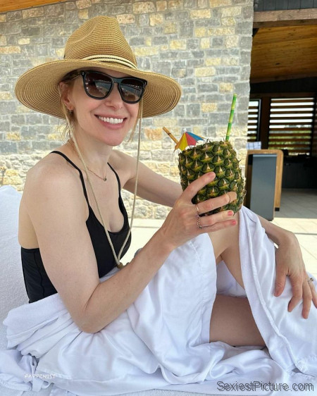 Laura Prepon Tits and Legs Swimsuit